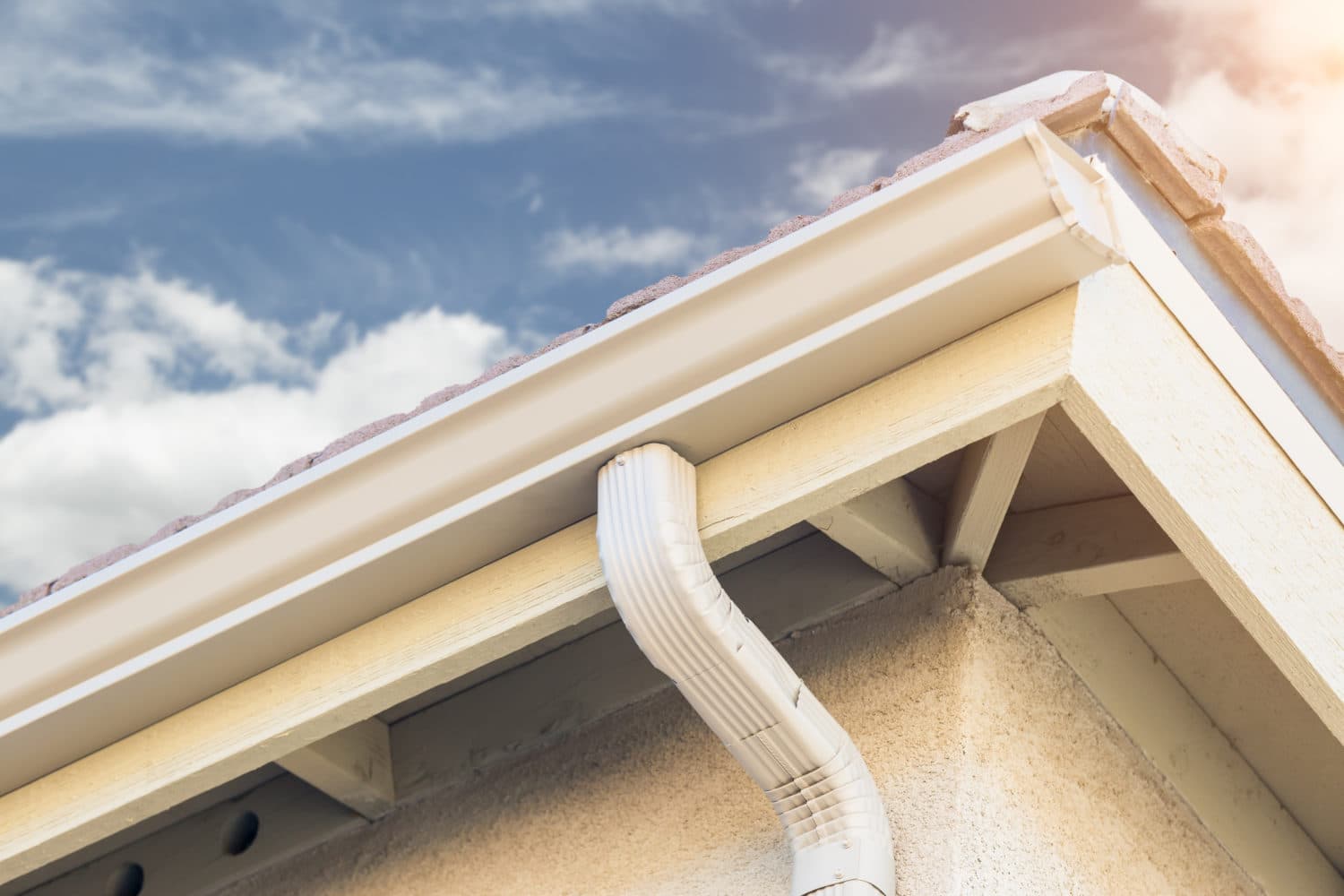 Finished seamless gutter and downspout on a home in Omaha, Nebraska